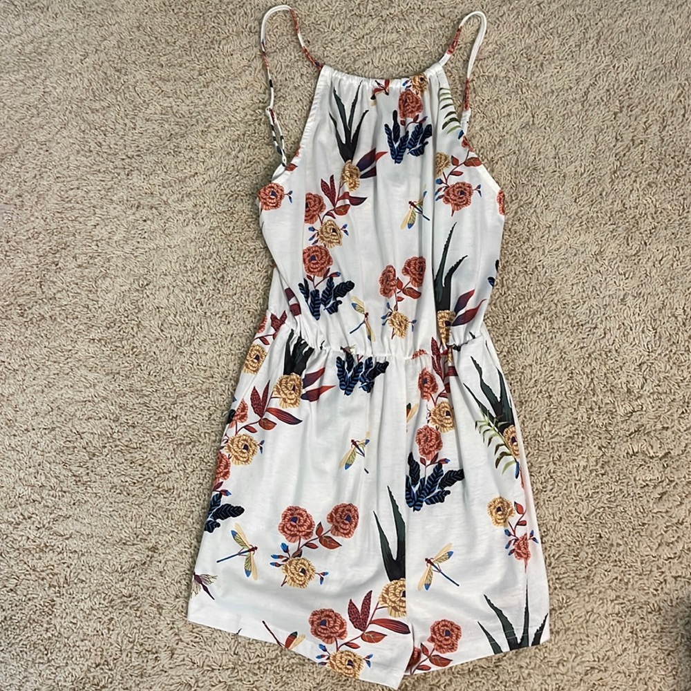 White romper with flower designs